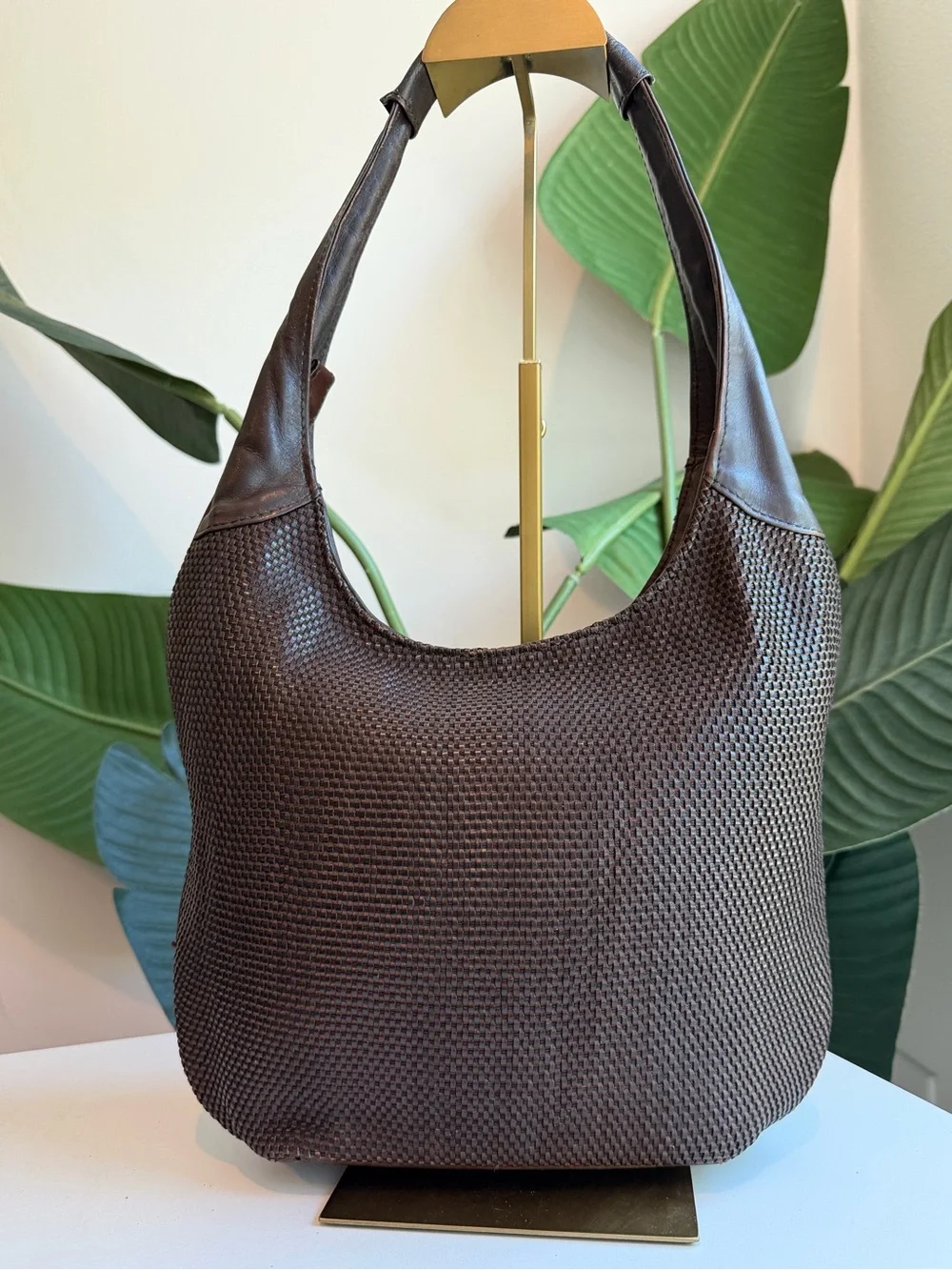 The Sak ‘Leather Woven Bag with Horn Closure.